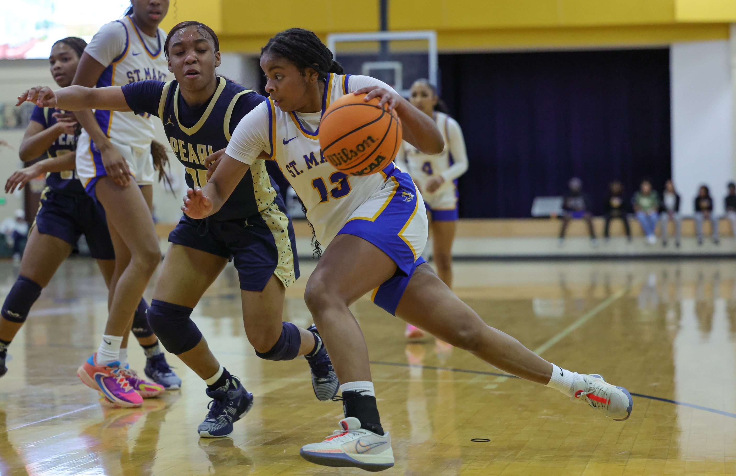 Prep Hoops: St. Martin turns Kennedy Family Affair into first playoff win in three years