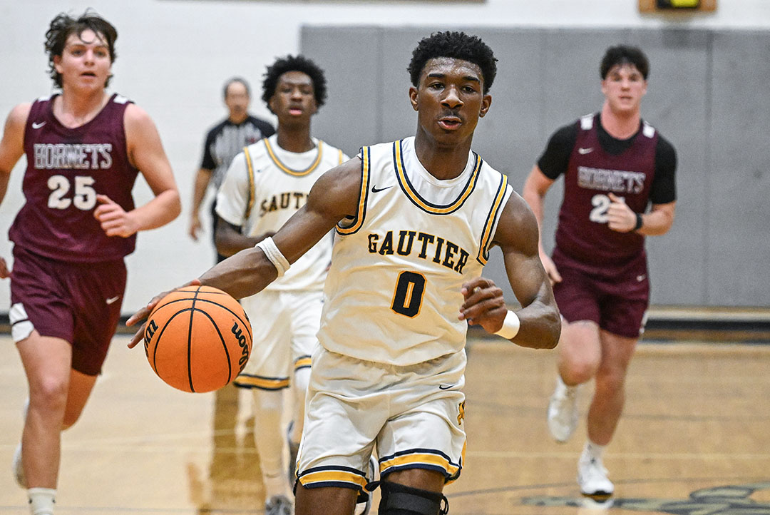 Prep Basketball: Gators secure a Class 5A playoff berth by thumping East Central 65-44