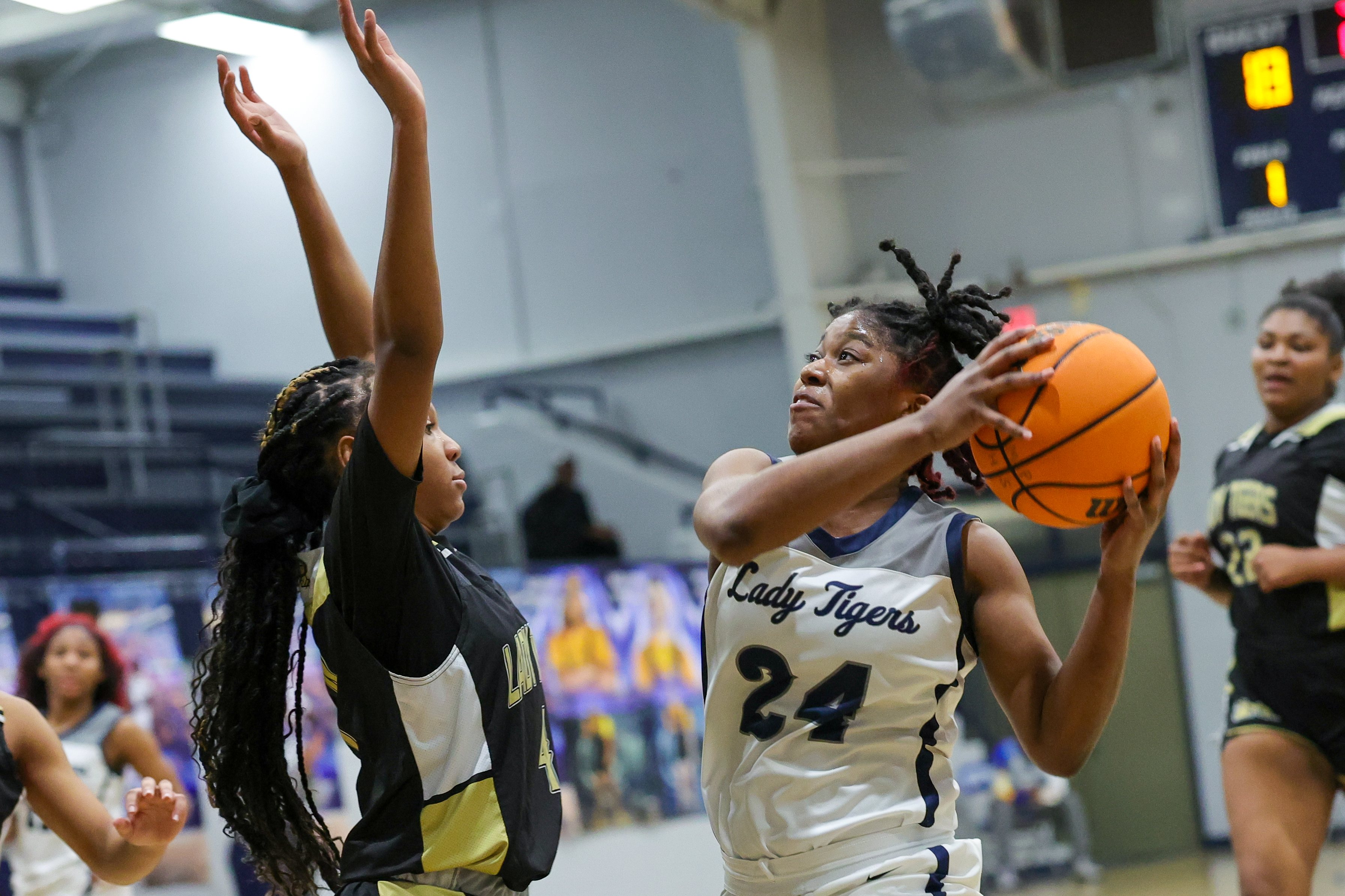 Prep Basketball: Moss Point girls hold Mendenhall scoreless in the final frame to pull out win