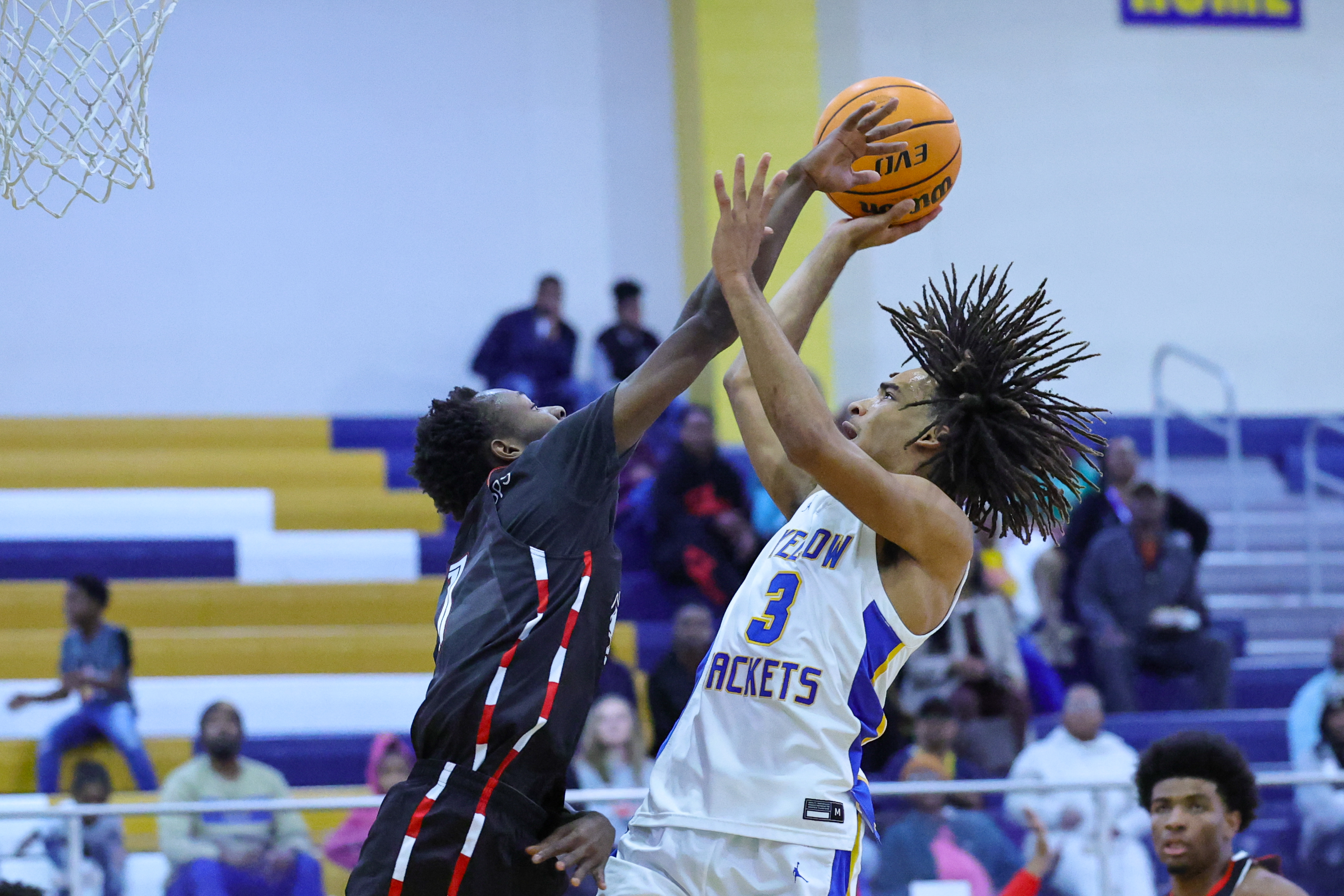 Prep Basketball: Indians slip past Yellow Jackets in overtime to open Region 4-7A play