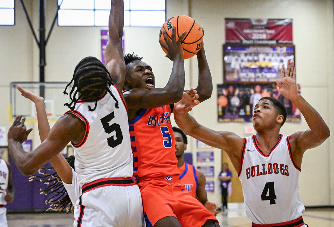 Prep Basketball: Admirals reverse home playoff woes from last year by bombing Bulldogs Friday night